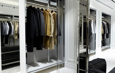 View in the inside of the Retail Fit-Out from Mackintosh (2015) filled with clothes